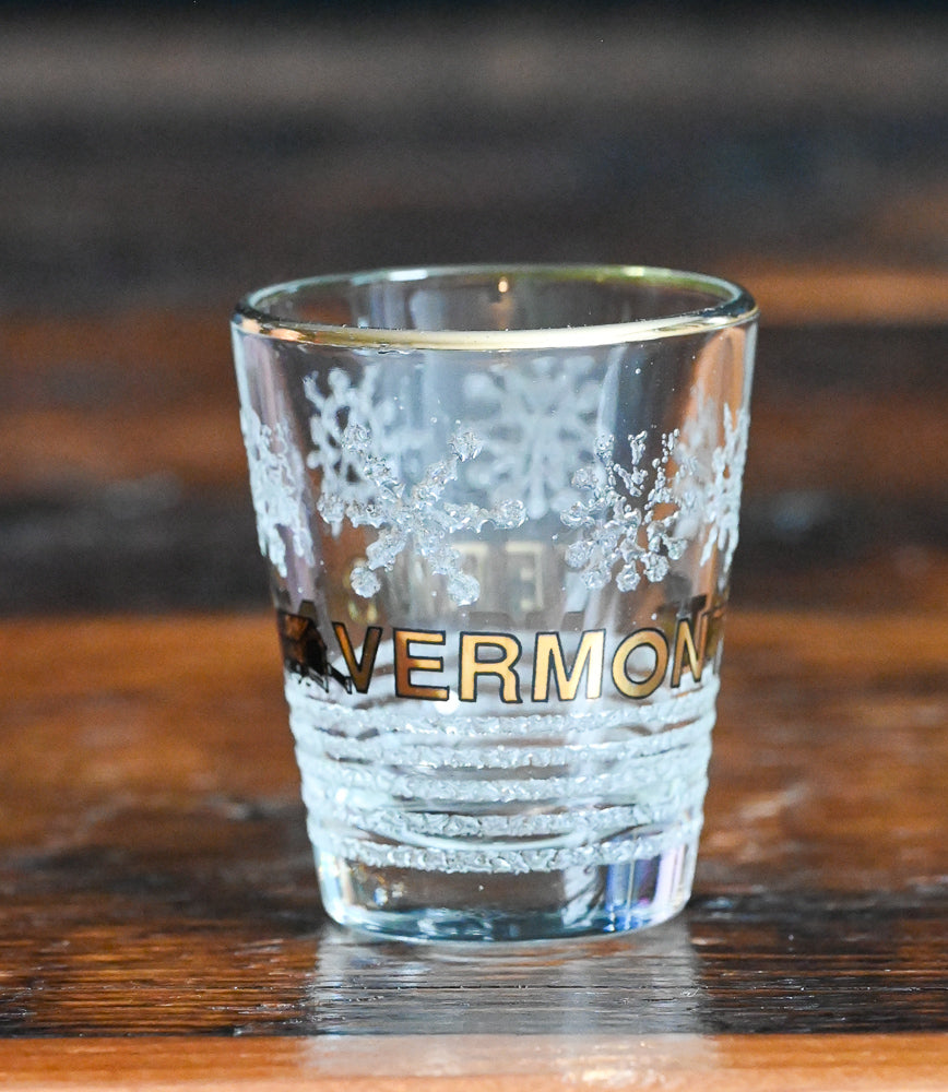 frosted snowflakes and gold print Vermont souvenir shotglass