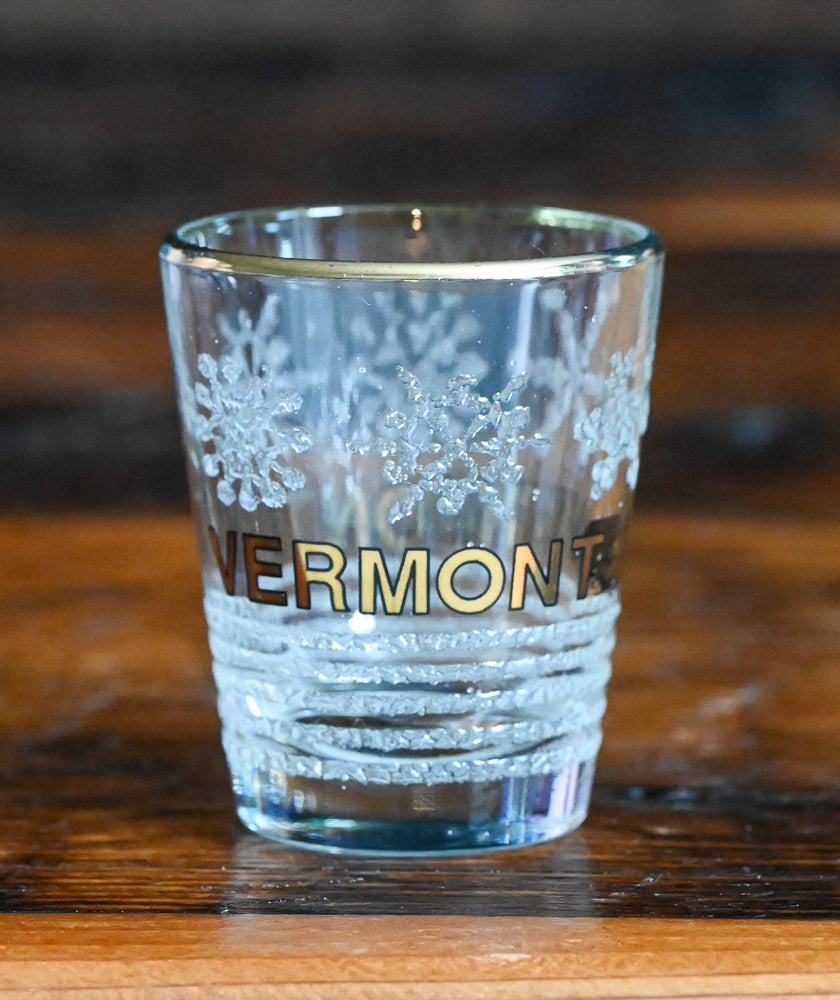 frosted snowflakes and gold print Vermont souvenir shotglass