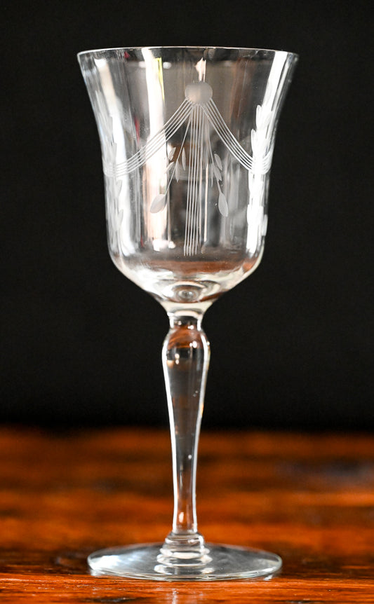banner and floral etched wine goblets