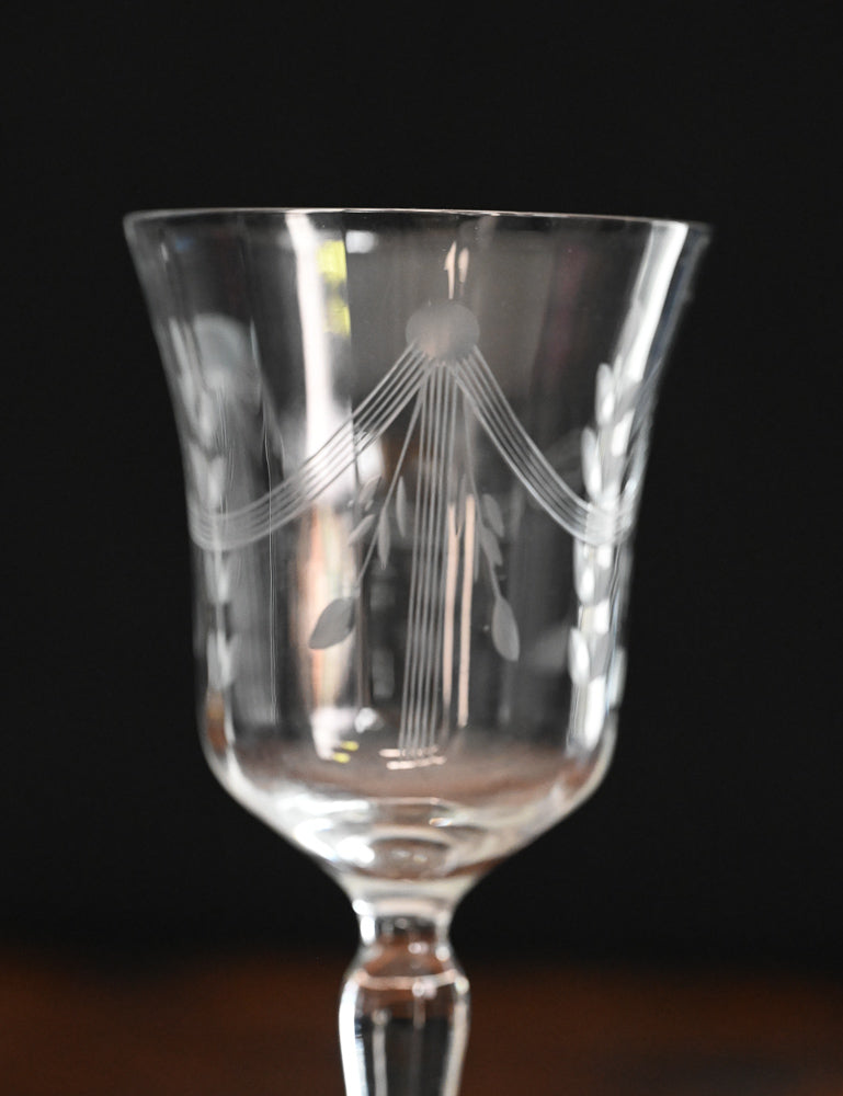 banner and floral etched wine goblets