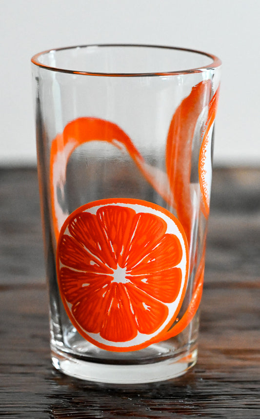 orange peel all around clear juice glass