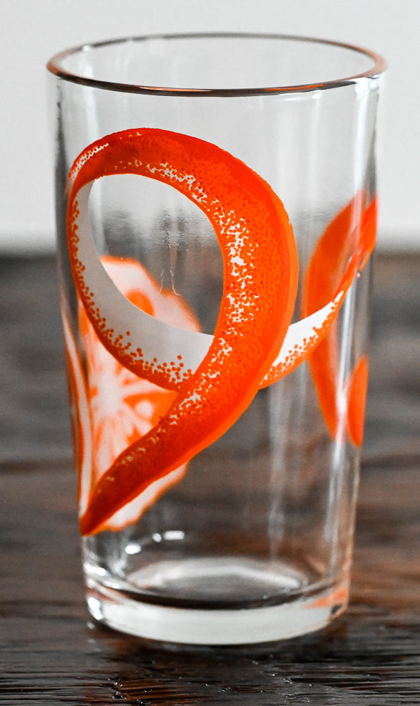 orange peel all around clear juice glass