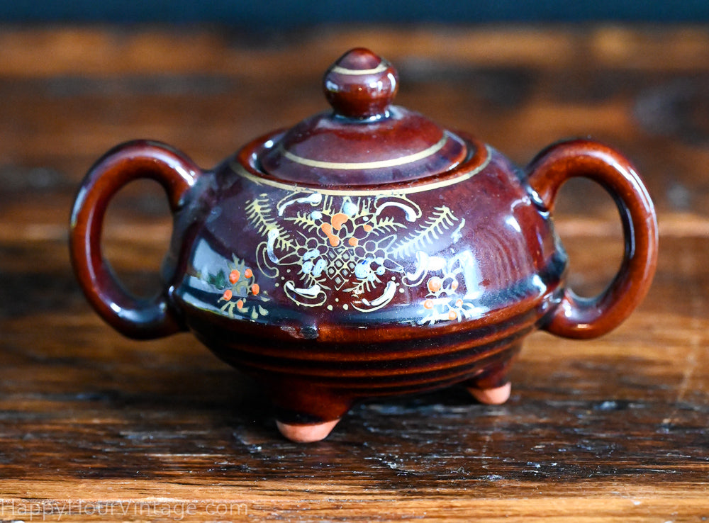 brown Redware sugar and creamer set, handpainted