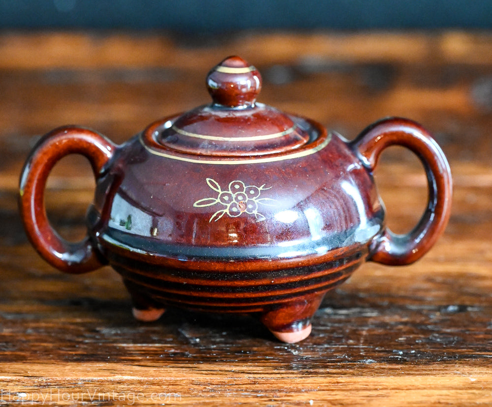 brown Redware sugar and creamer set, handpainted