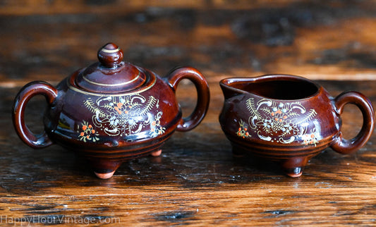 brown Redware sugar and creamer set, handpainted