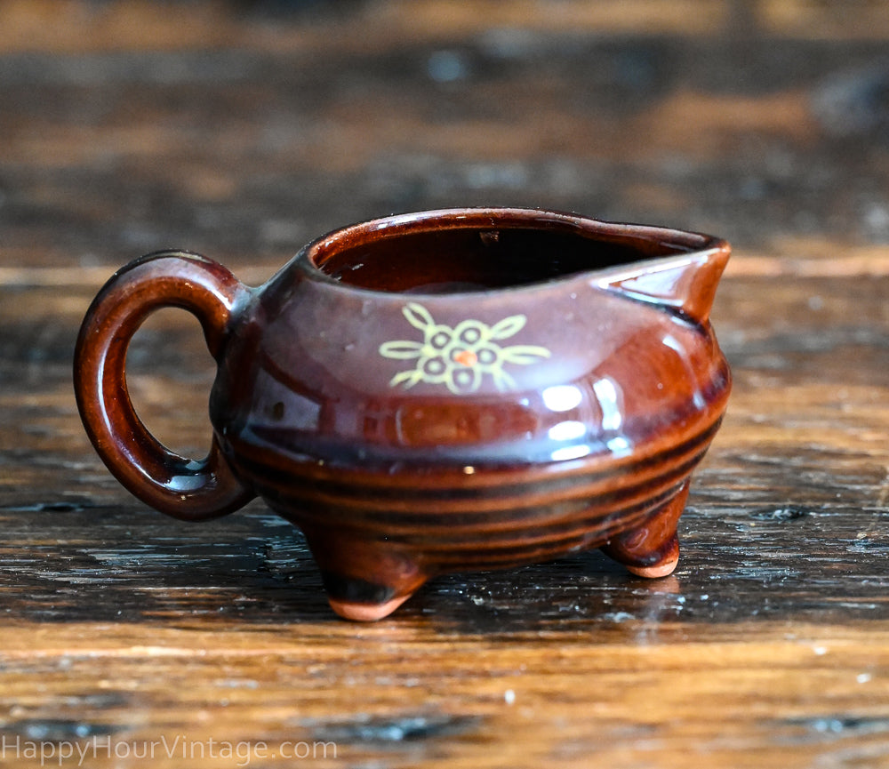 brown Redware sugar and creamer set, handpainted