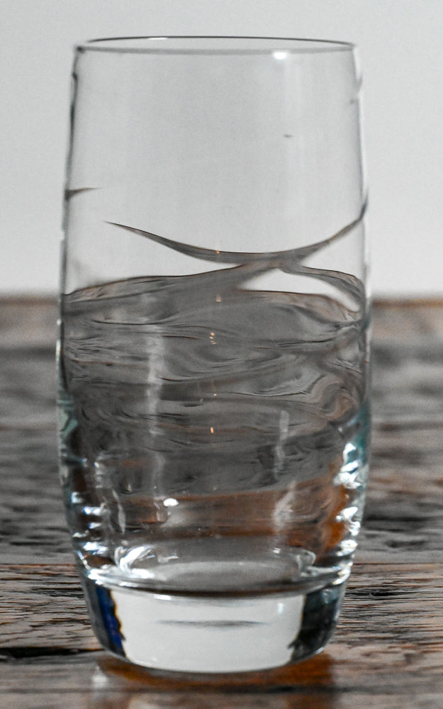 clear water glass with swirls