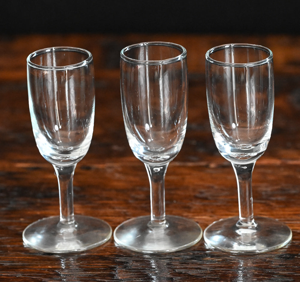 3 clear cordial glasses