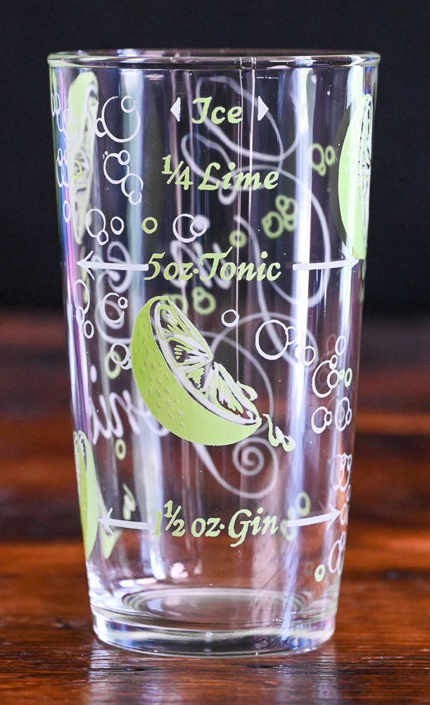 Gin and Tonic tumblers with recipe and sliced limes in green and white