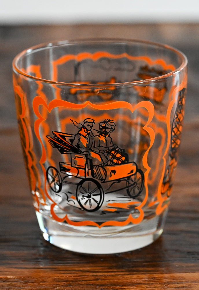 orange and black transportation print lowball glass