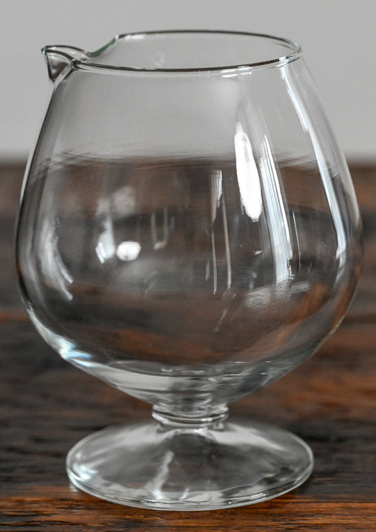 clear glass stemmed mixing glass with spout
