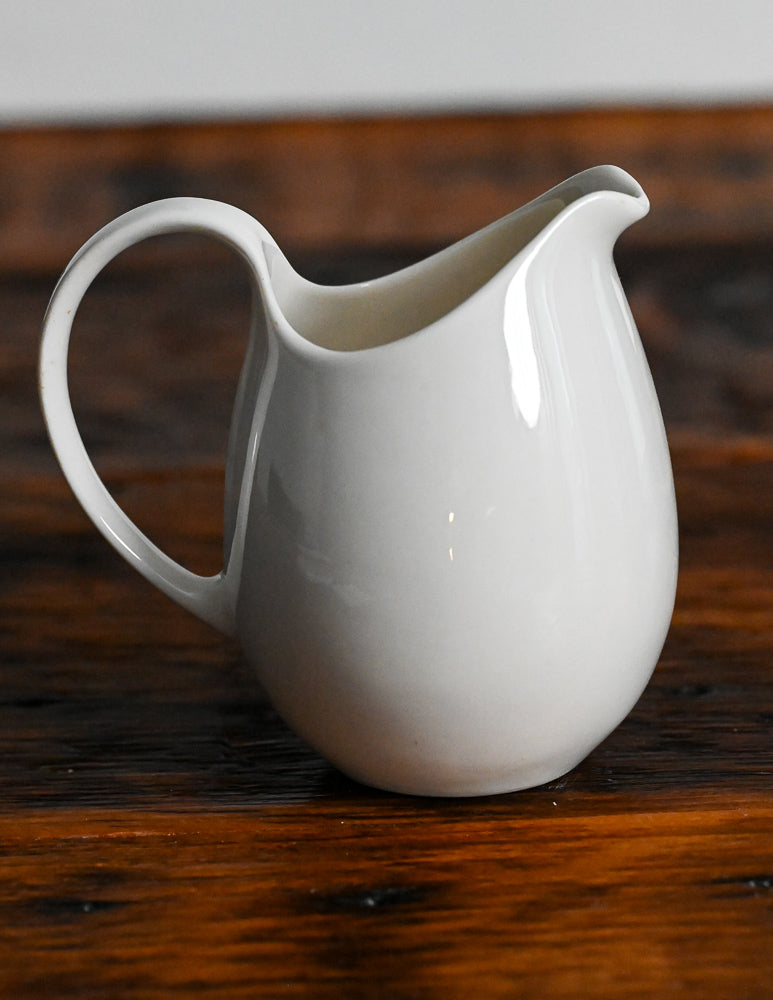 cream pitcher with gray and light blue stars print