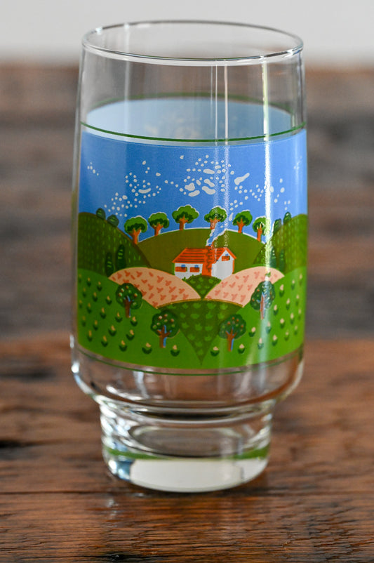 Farm scene print glass on wooden table