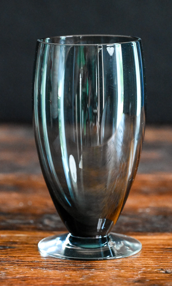 gray glass footed tumbler