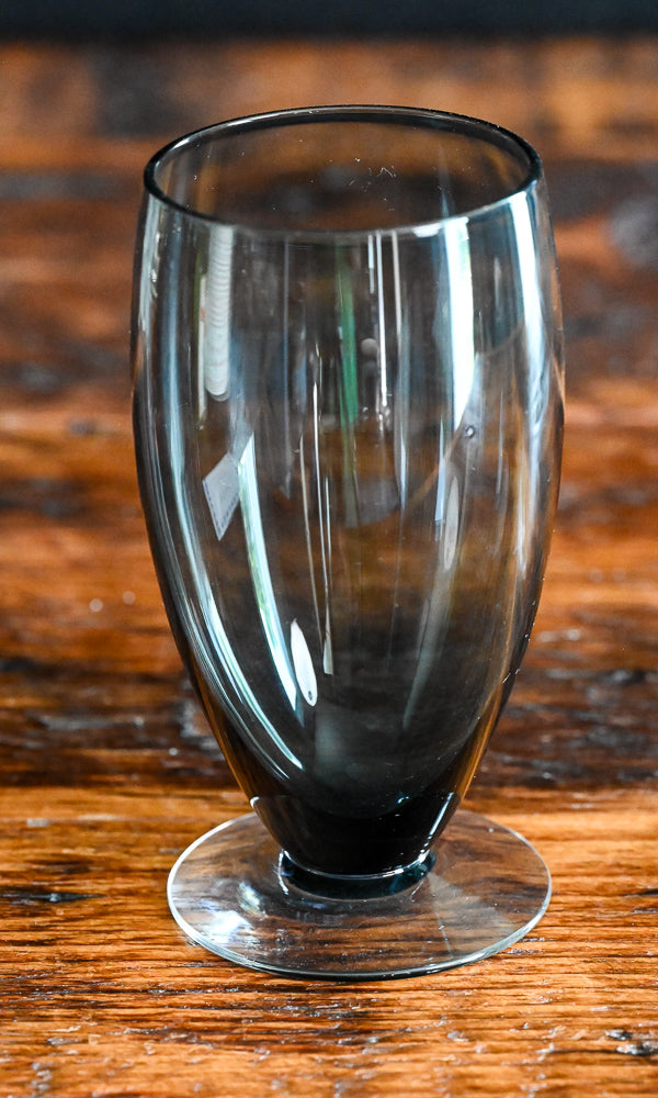 gray glass footed tumbler