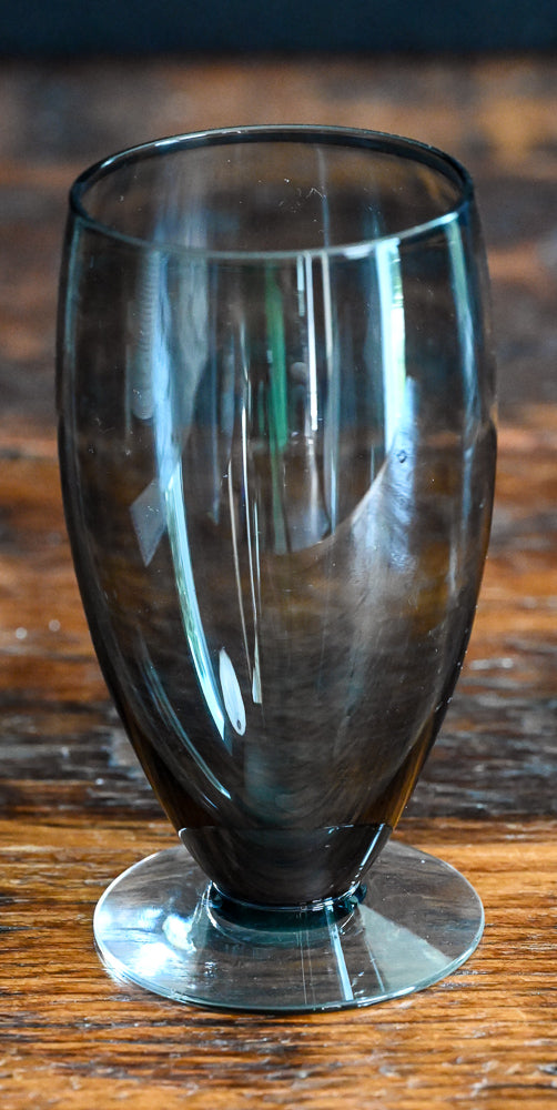 gray glass footed tumbler