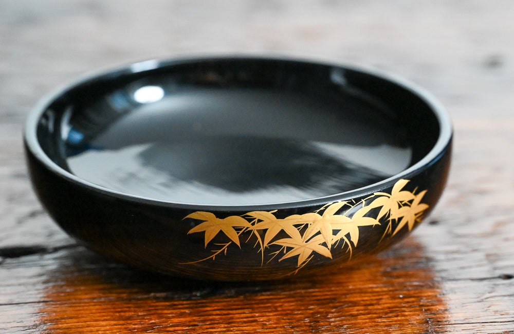 black bowls with gold flowers design 