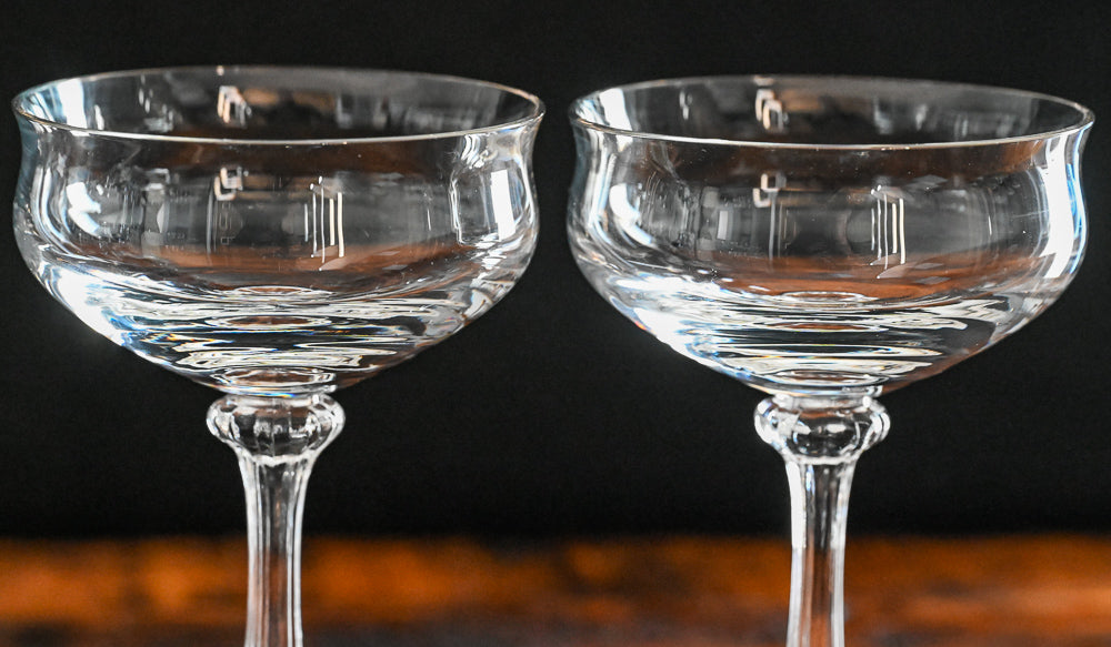 clear stemmed champagne coupes