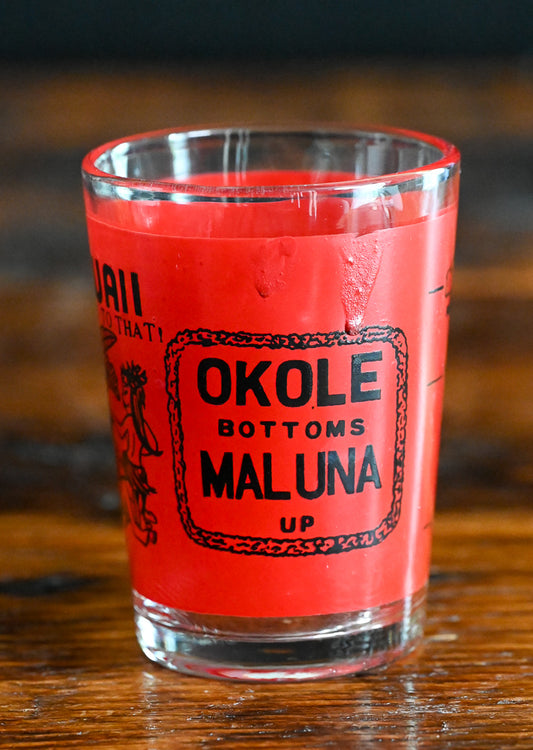 Hawaiian shotglass in red with black print