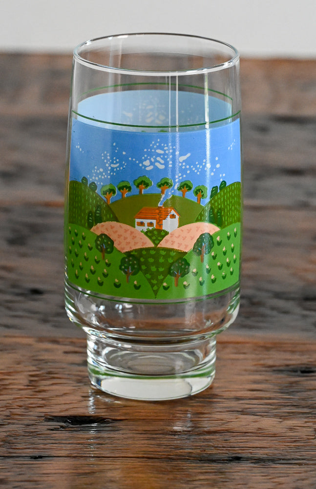 farm scene tumbler glass on wooden table