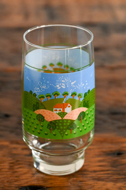 Sango farm scene tumbler glass on wooden table