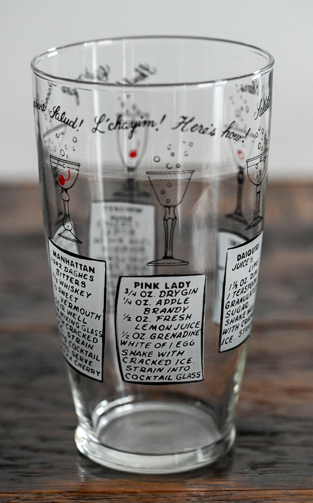 Anchor Hocking mixing glass with cocktail recipes on it