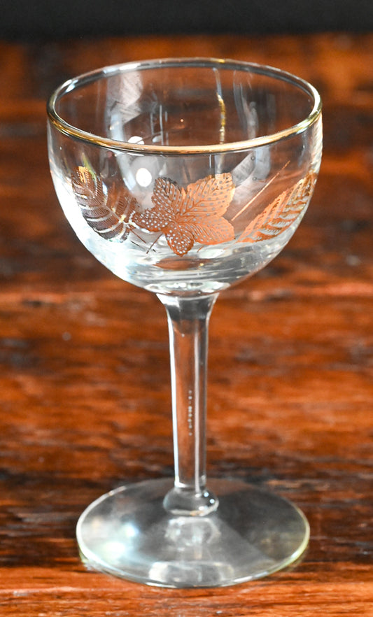 gold leaf and gold rim cocktail coupes