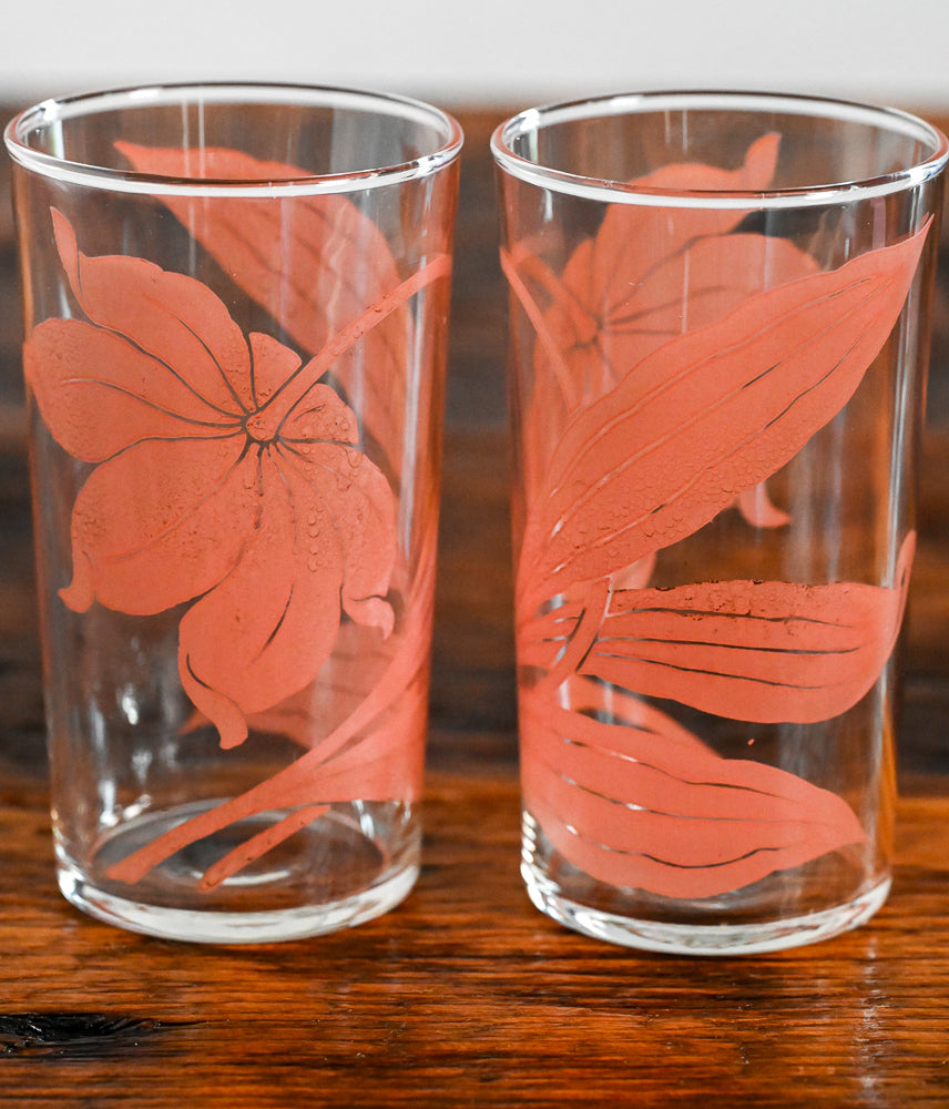 pink floral print tumblers on wood table