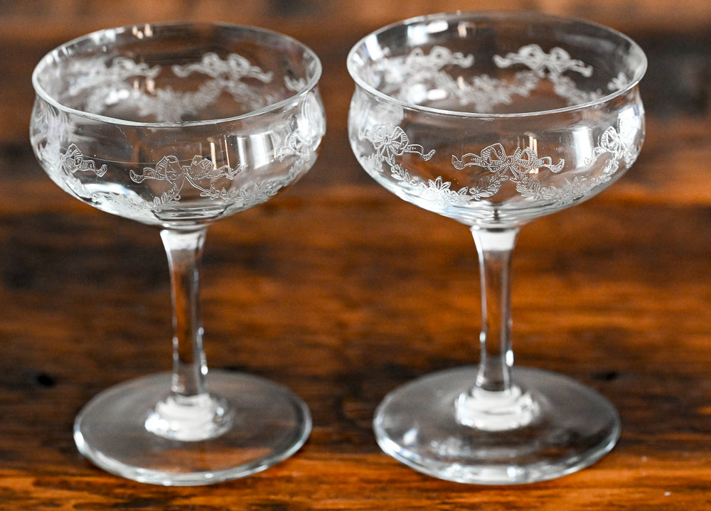 bow and flower etched cocktail coupes