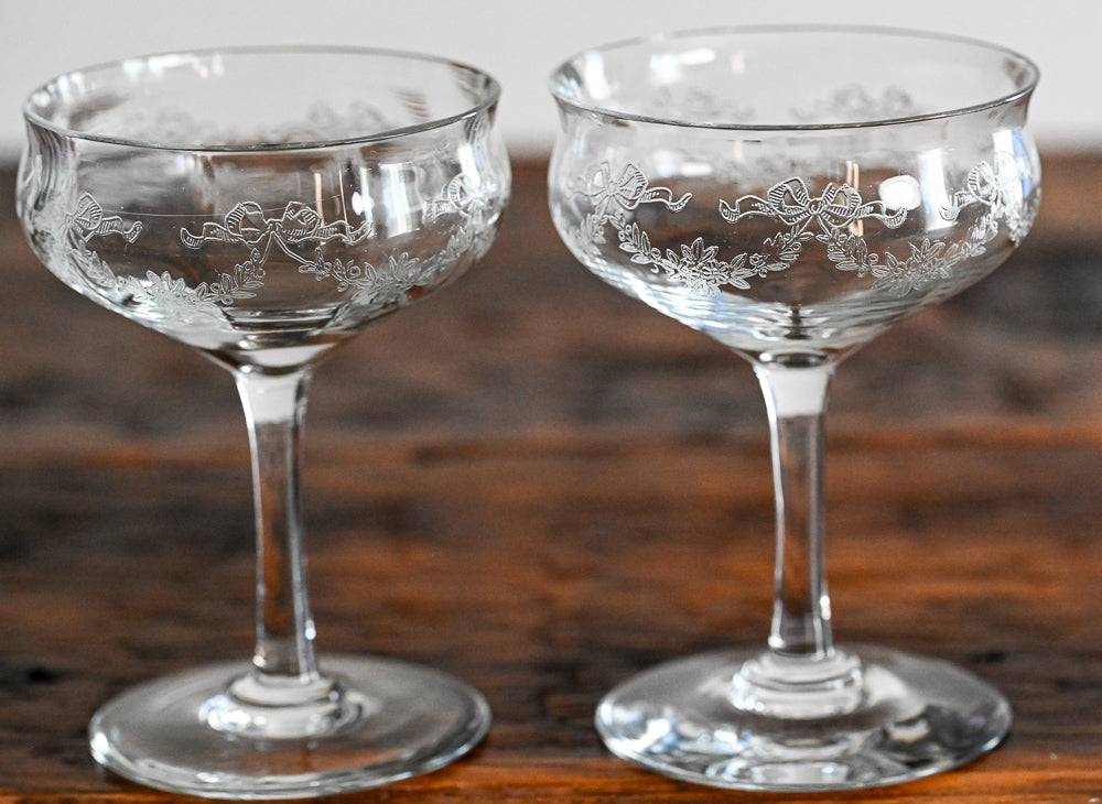 bow and flower etched cocktail coupes