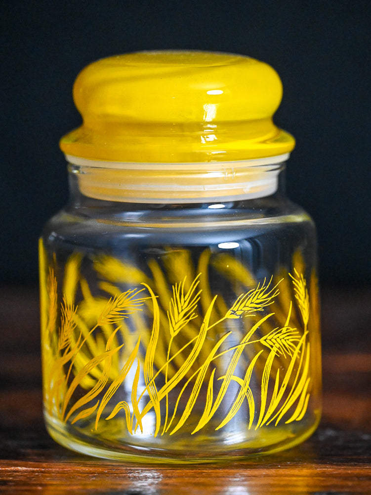 yellow wheat print, yellow lid Anchor Hocking apothecary jar