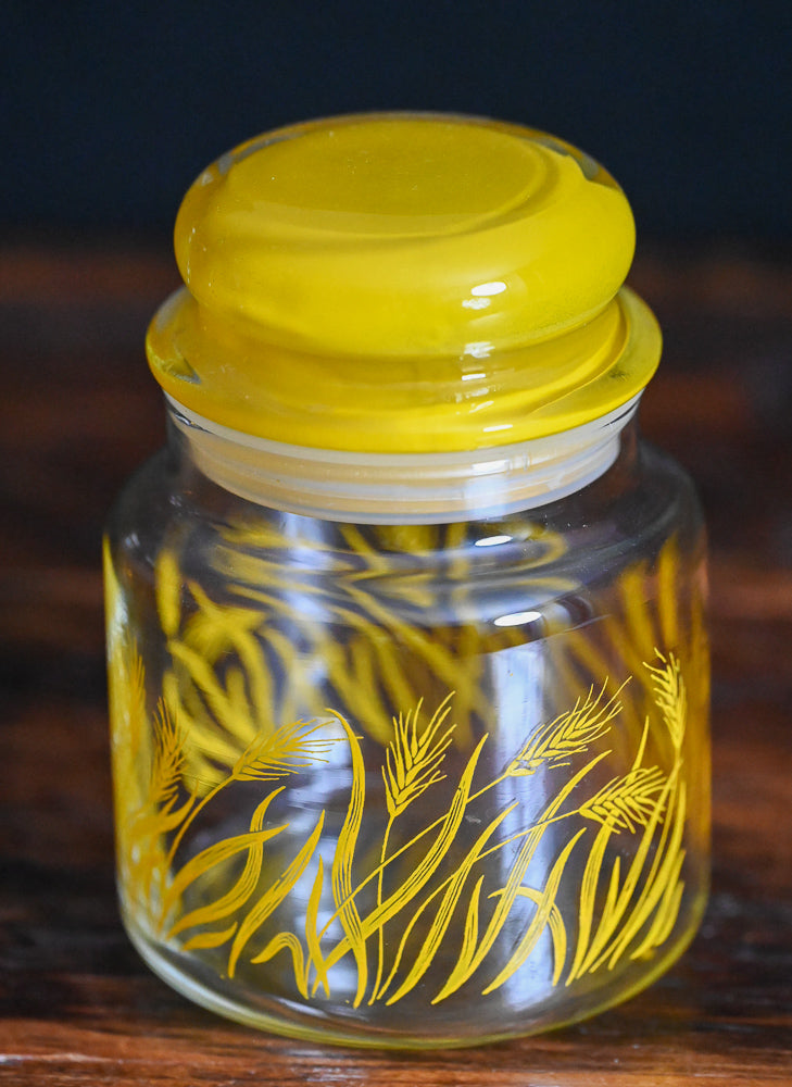 yellow wheat print, yellow lid Anchor Hocking apothecary jar