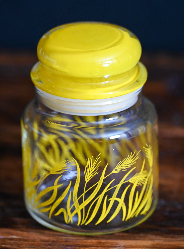 yellow wheat print, yellow lid Anchor Hocking apothecary jar