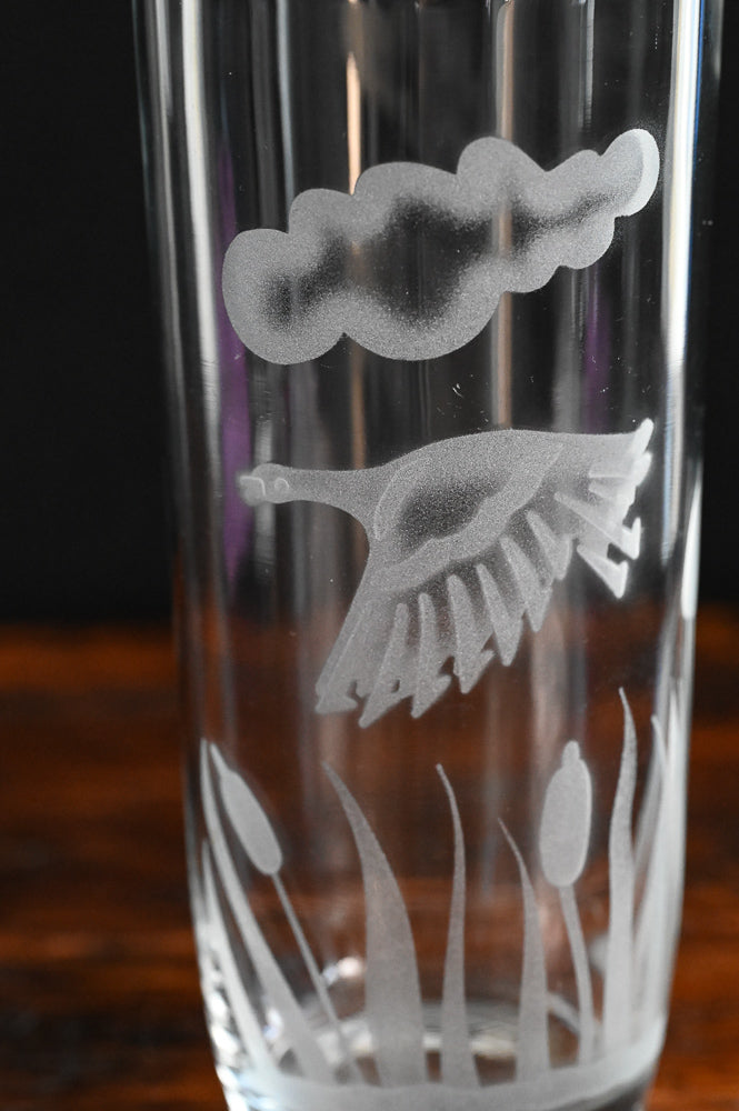 Etched duck, cloud and reeds on clear glass cocktail shaker with metal top