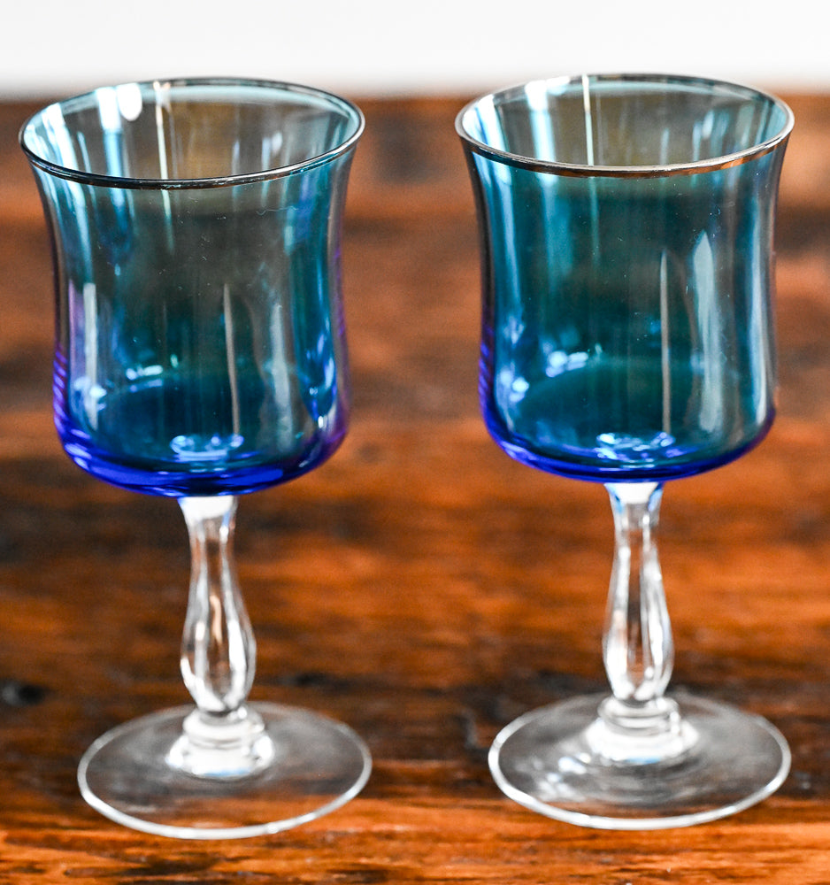 blue glass Noritake wine glass, clear stem and foot