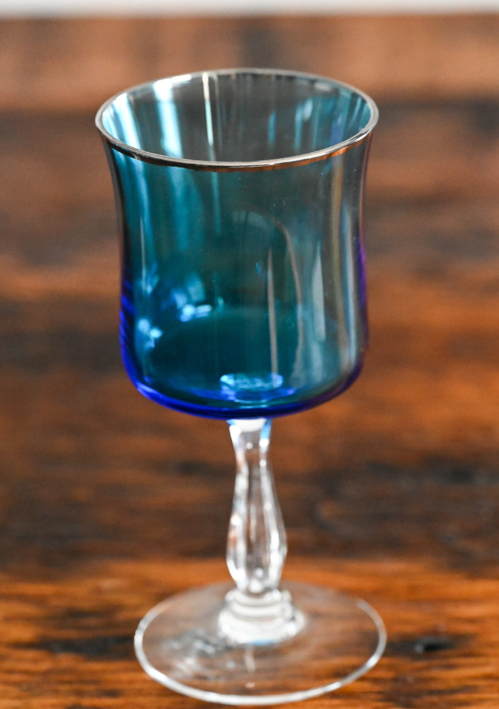 blue glass Noritake wine glass, clear stem and foot