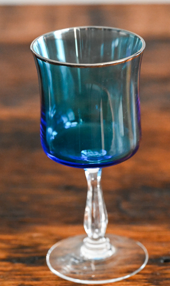 blue glass Noritake wine glass, clear stem and foot