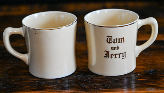 cream china Homer Laughlin Tom and Jerry Mugs, gold words and rim