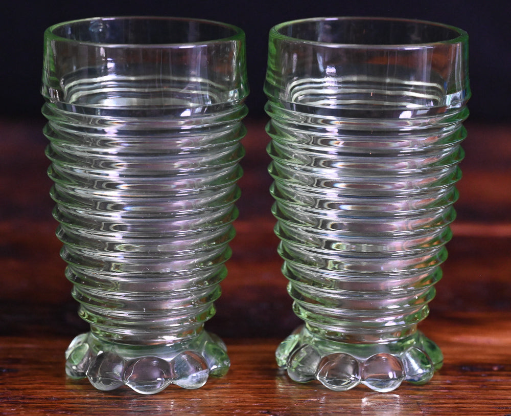 light green Uranium Anchor Hocking Manhattan footed tumblers