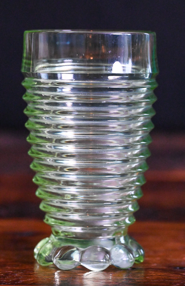 light green Uranium Anchor Hocking Manhattan footed tumblers
