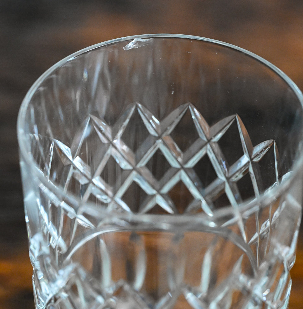clear tall glass with diamond cut pattern