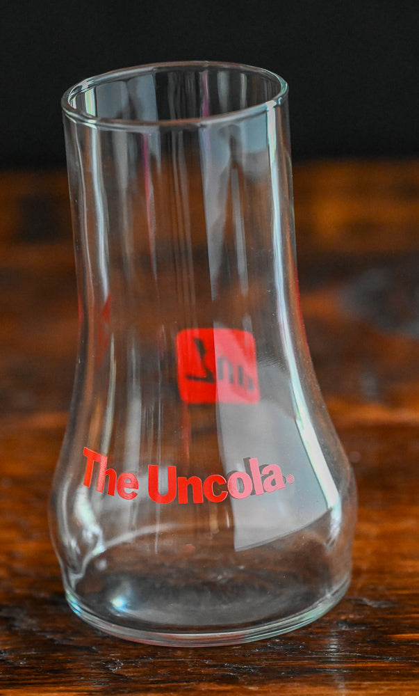 7-Up the Uncola glass, red print on upside down glass