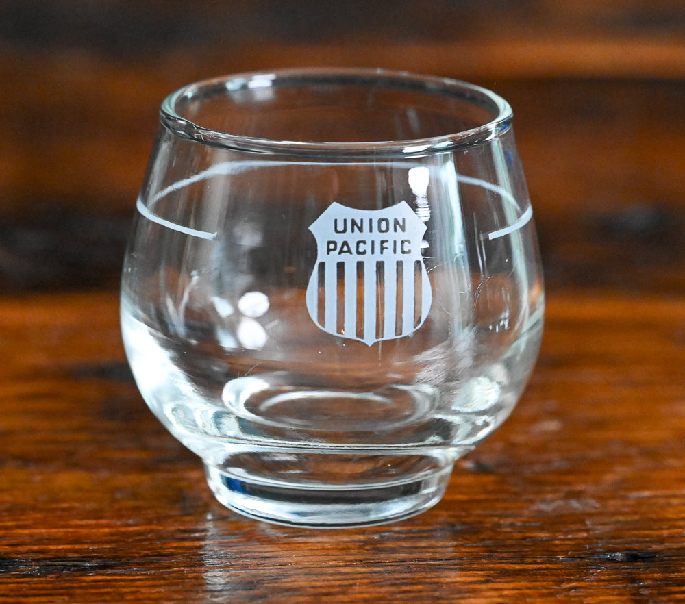clear Union Pacific roly poly glass with frosted logo