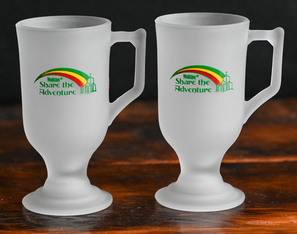 frosted mug with Watkins logo in green