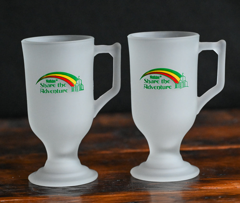 frosted mug with Watkins logo in green