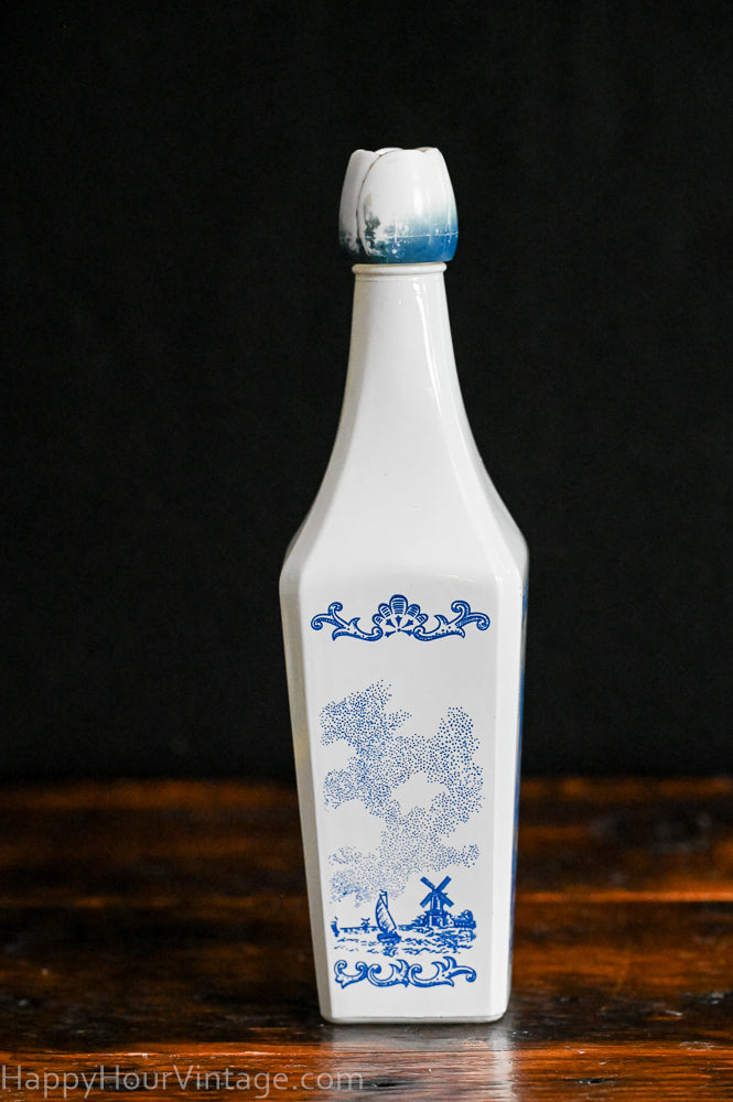 blue and white milk glass liqueur bottle