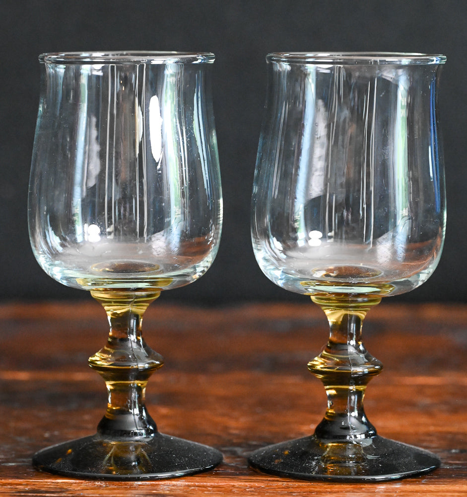 clear Libbey wine glasses with brown glass stem