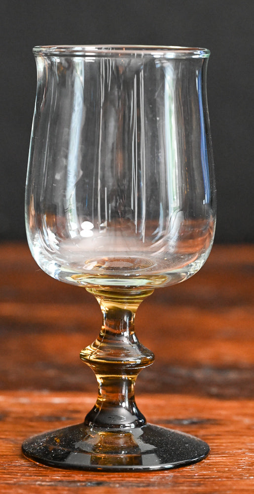 clear Libbey wine glasses with brown glass stem