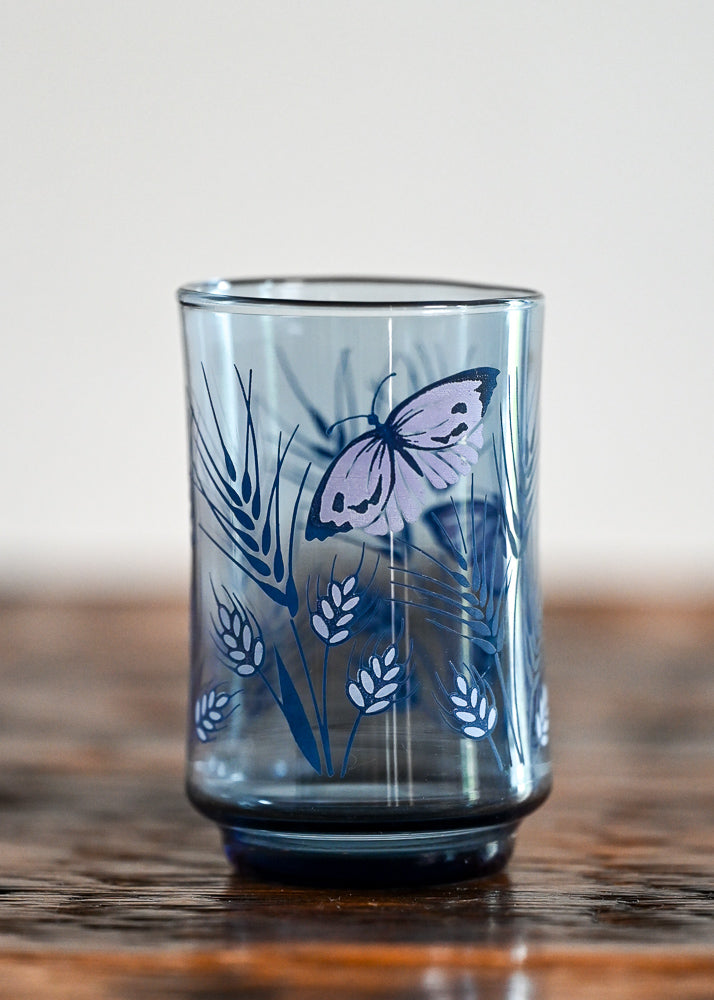 blue glass with butterfly and wheat print