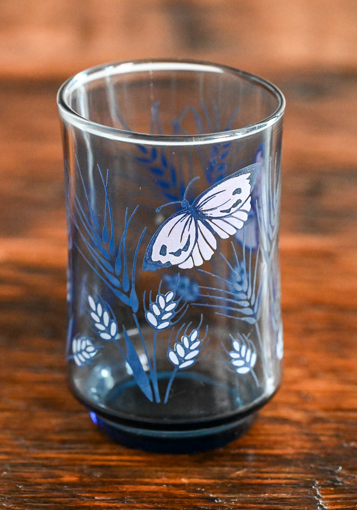 blue glass with butterfly and wheat print